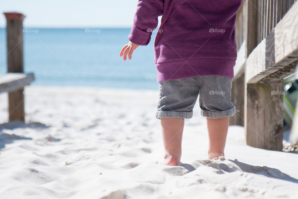 Little toes in sand