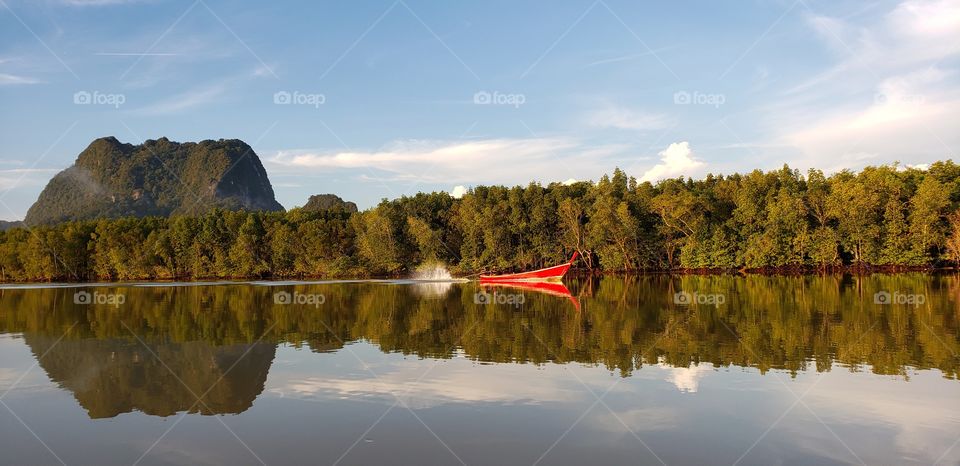 Beautiful lake boat reflection