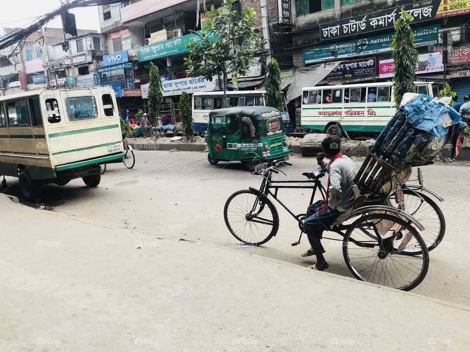 Taking Rest By A Rickshaw Puller.... 