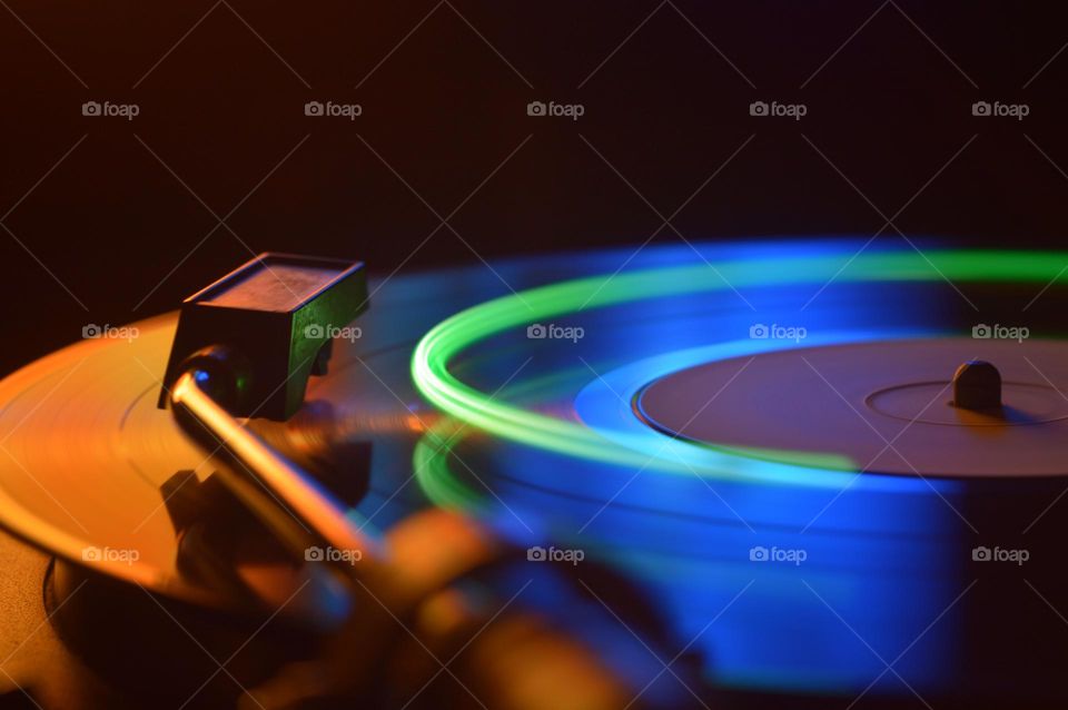 old record player made in Poland. Long exposure shot with lighting effects.