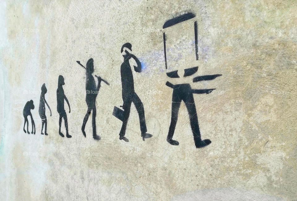 street art on the evolution of man