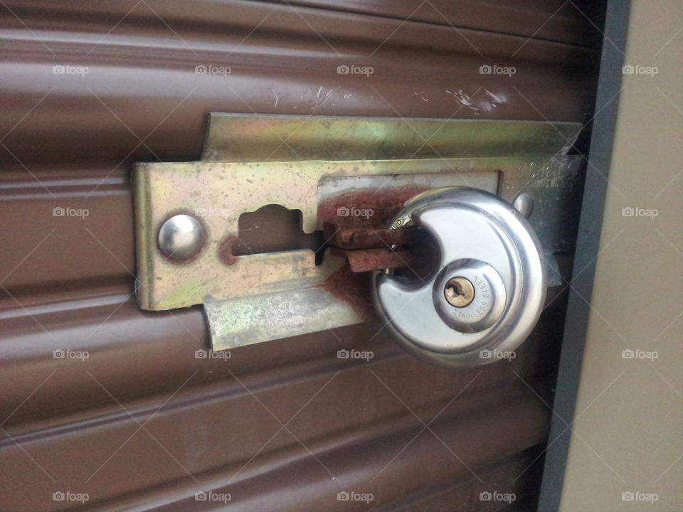 lock up. a round lock on a storage unit