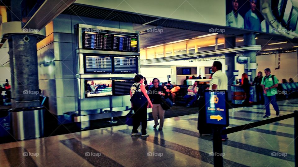 Checking the Arrival departure screen..Fort Lauderdale international airport