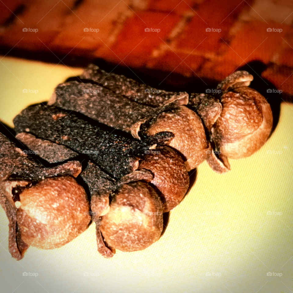 Closeup photo of Fresh natural dry cloves.World in macro