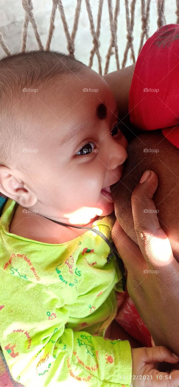 Breast feeding with love and tenderness