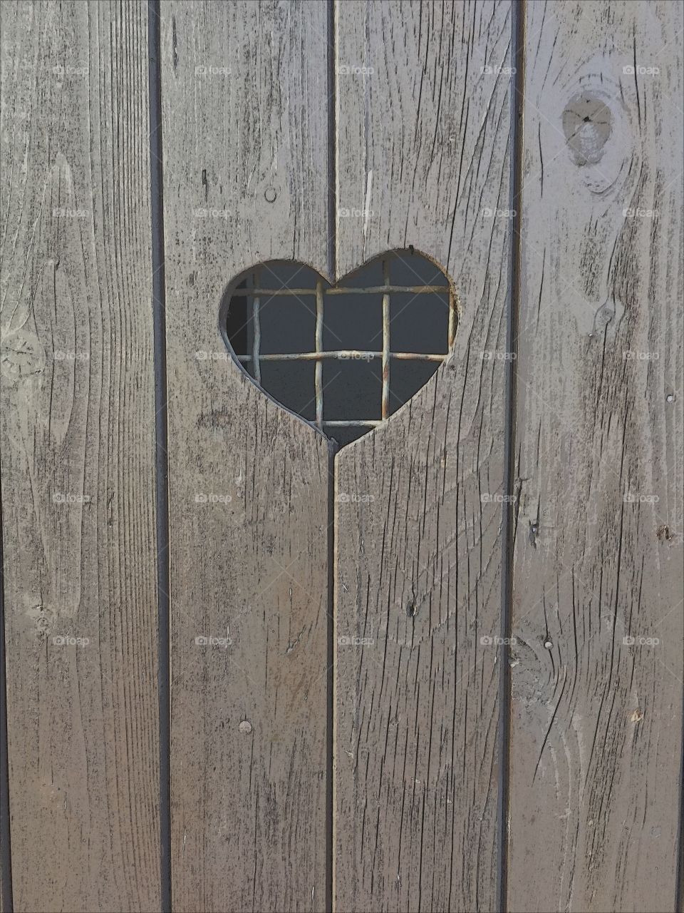 Heart shape on wooden door