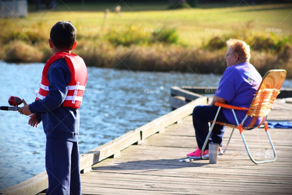 Fishing on the pier with grandma