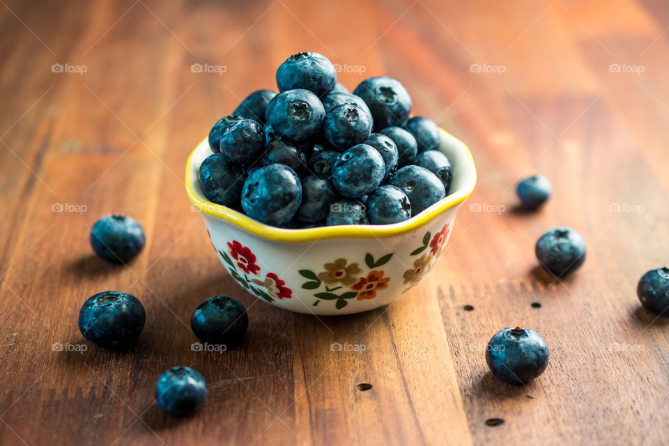 Fresh Blueberries in a Bowl on a Wood Table 2