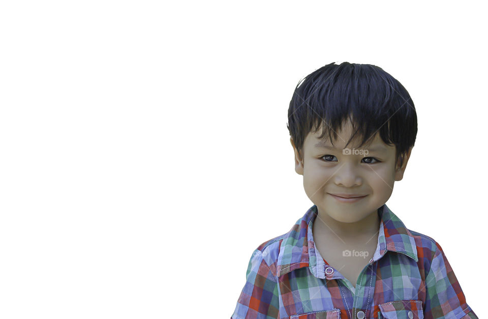 Isolated Portrait Asian boy smiled happily on white background with clipping path.