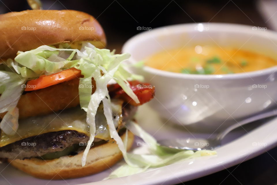 Burger and soup on a plate 