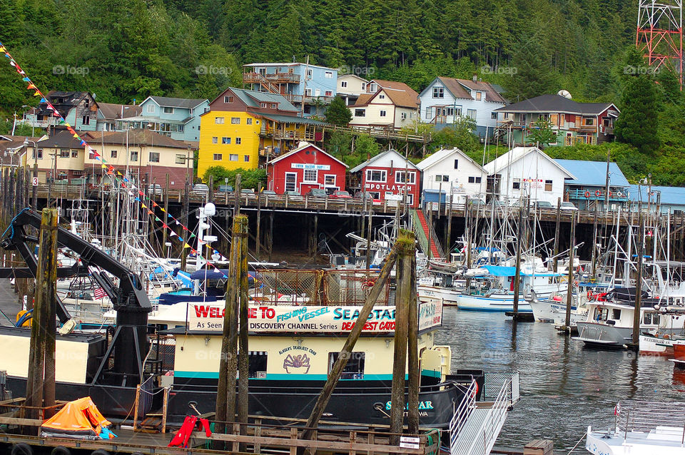 Ketchikan, Alaska harbor, docks, boats, houses on hill, fishing industry
