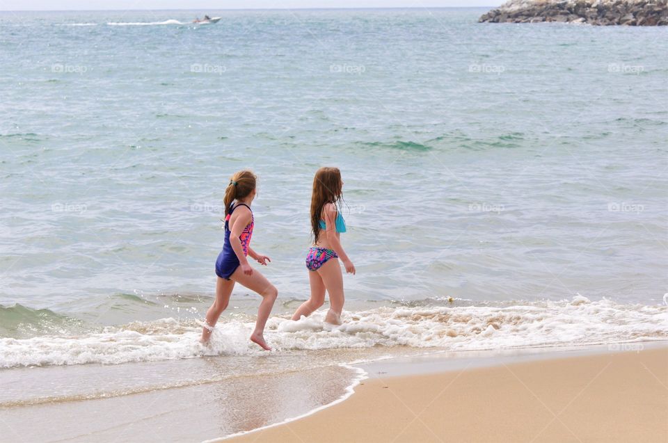 Kids playing at the beach