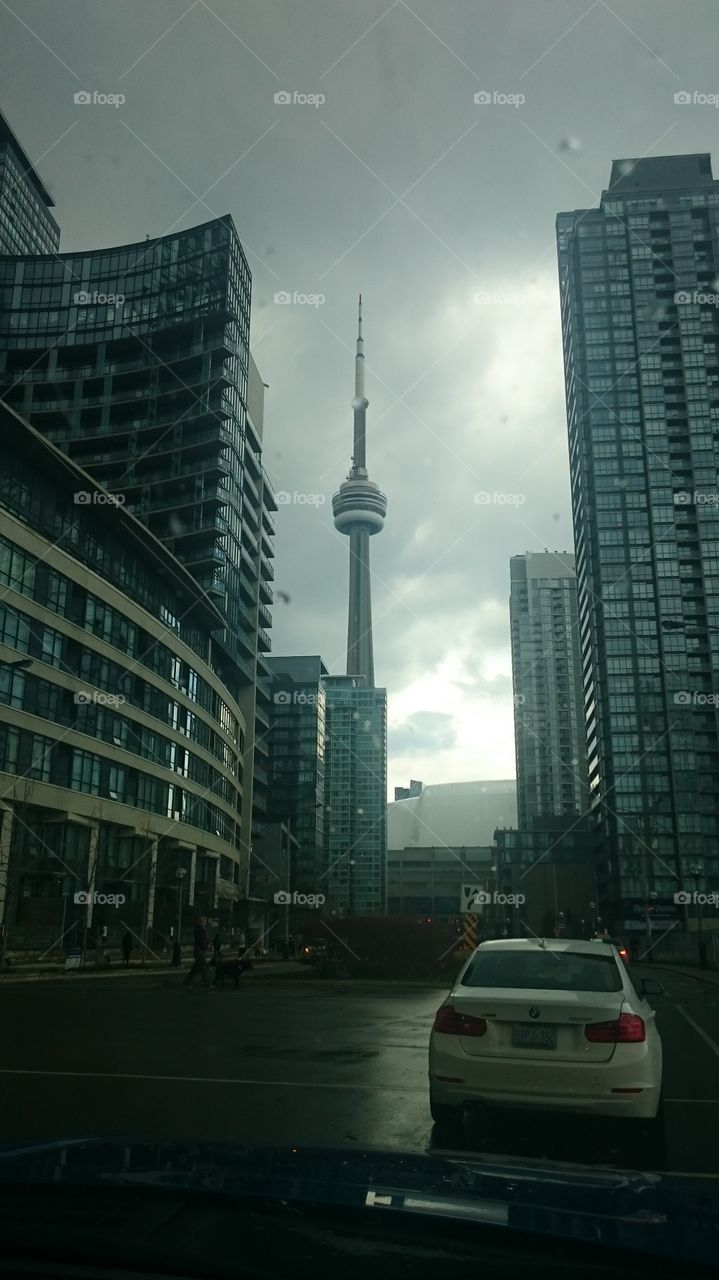 Downtown Toronto . Coming up to the tower in Toronto in the rain 