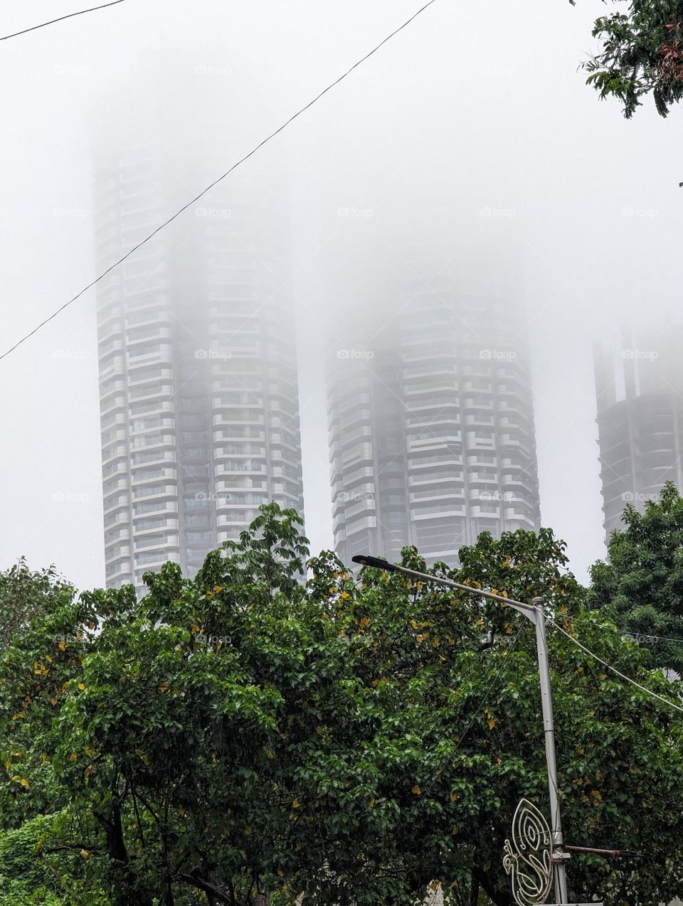 clouds covered the tall buildings.