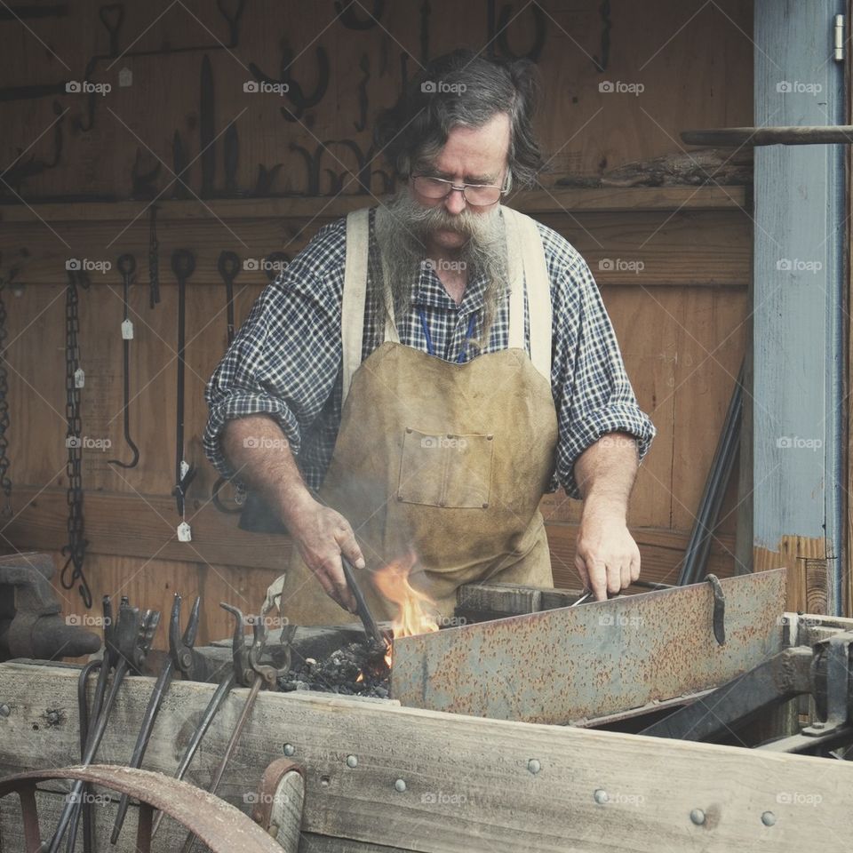 Blacksmith working.