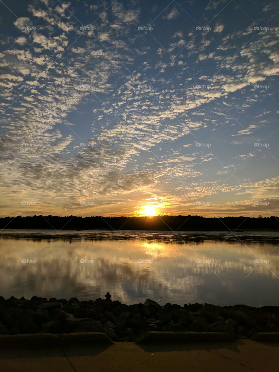 Sunrise and clouds over the Mississippi River