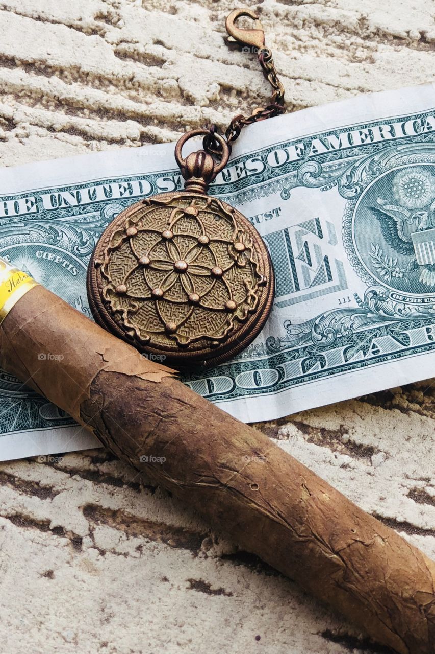Cigar and money