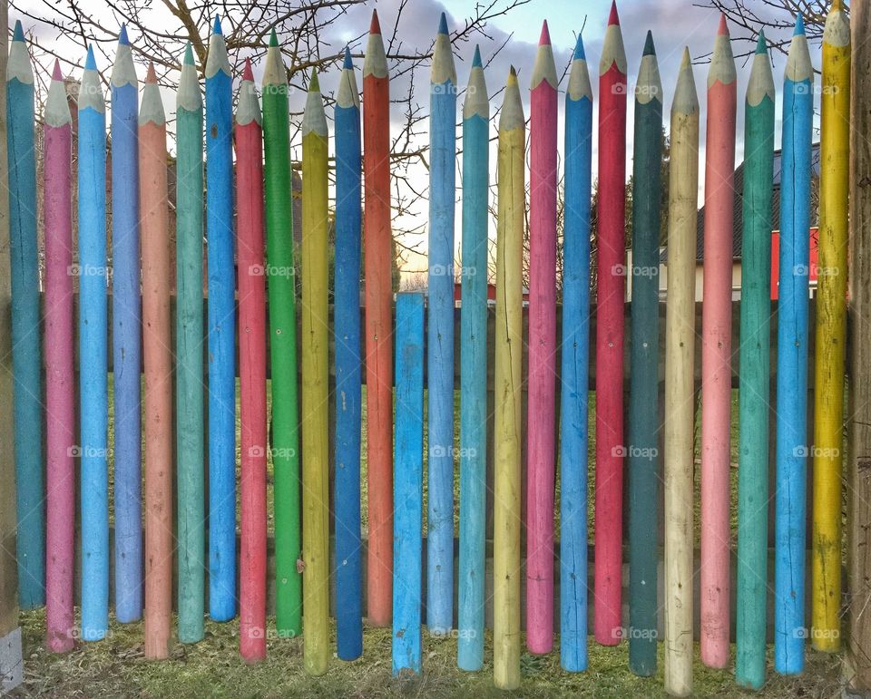 Big colored pencils as a fence