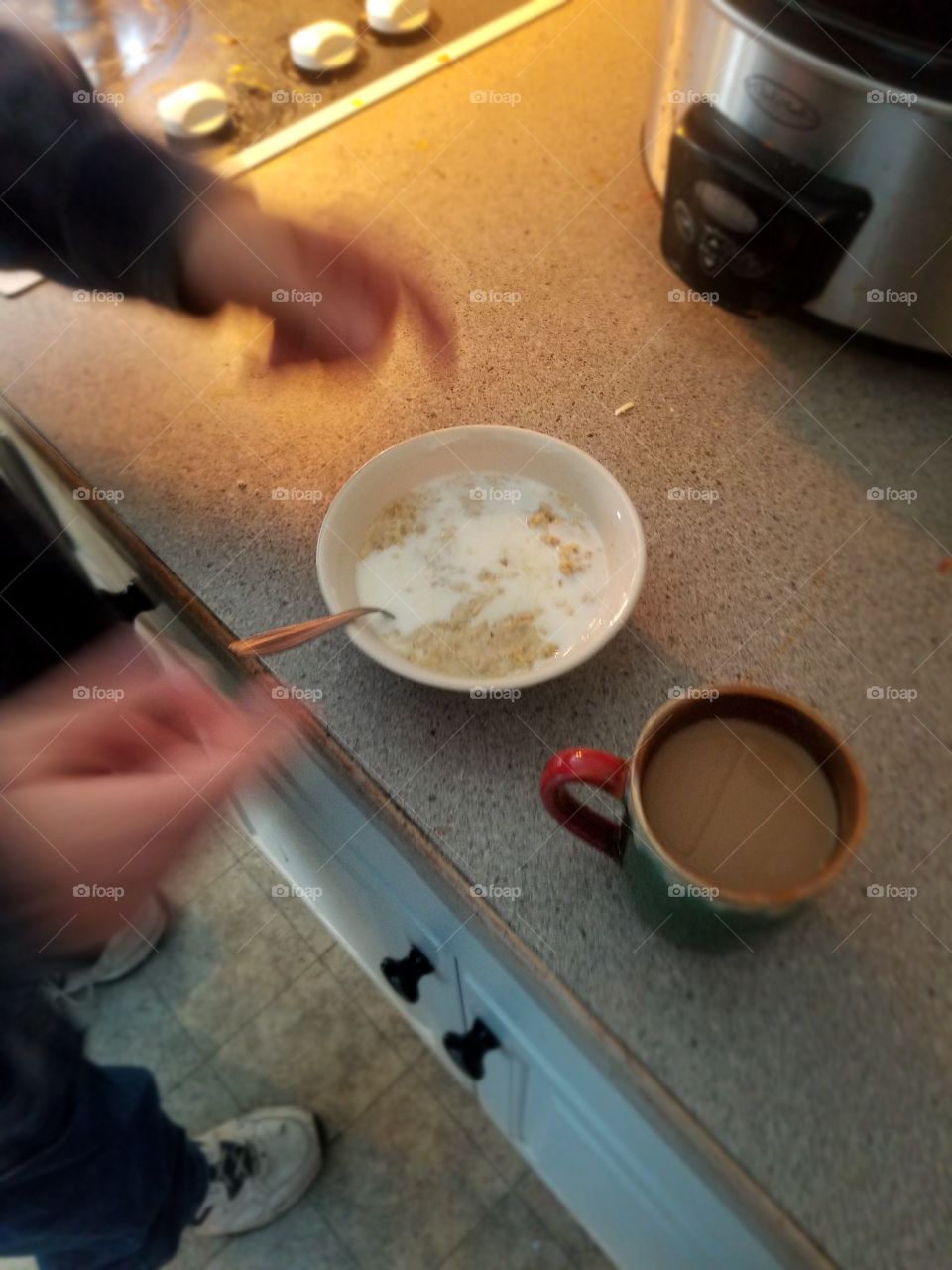 Preparing a bowl of oatmeal in the morning.