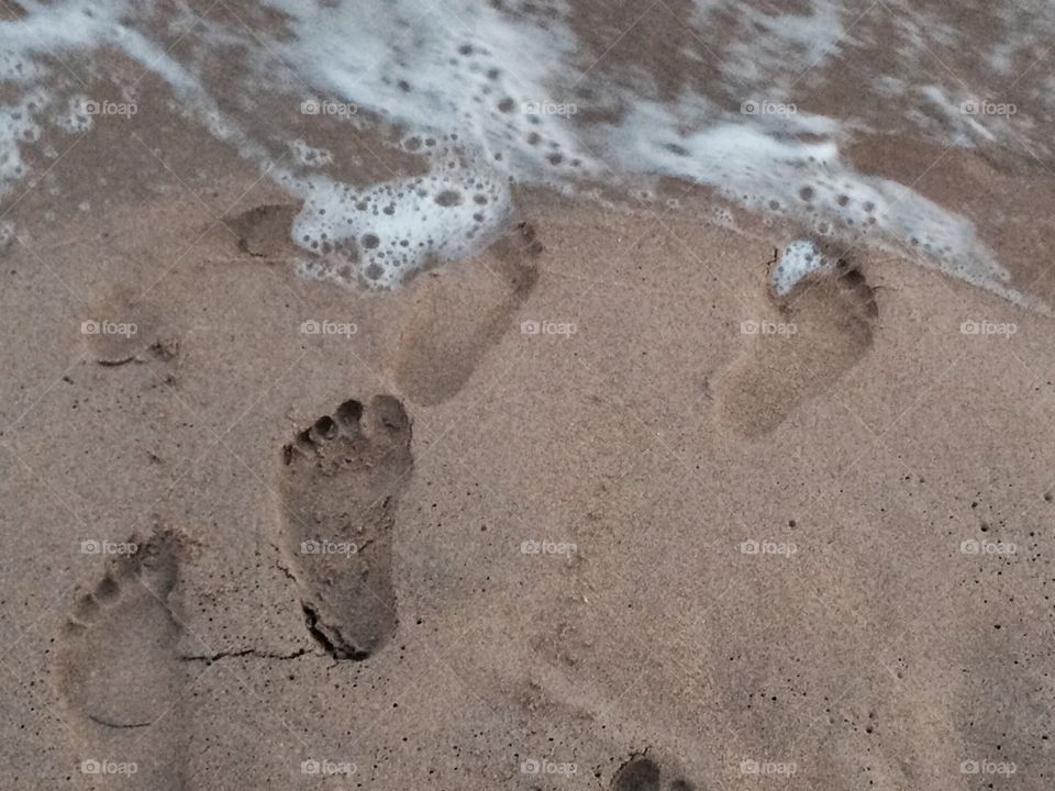 Footprints in the sandy beach