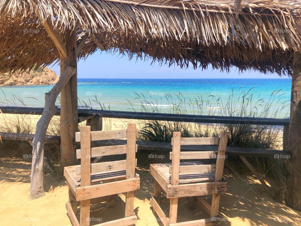 Summer vibes, beach scene, shades of blue, seascape