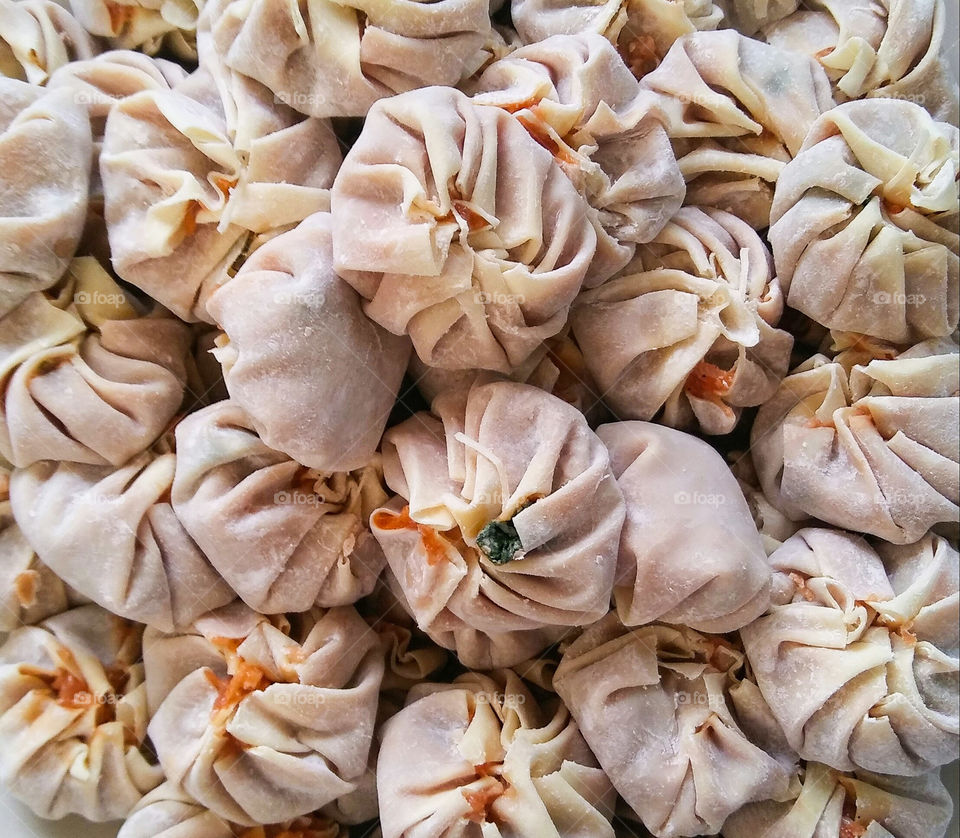Raw dumpling close up view for background.