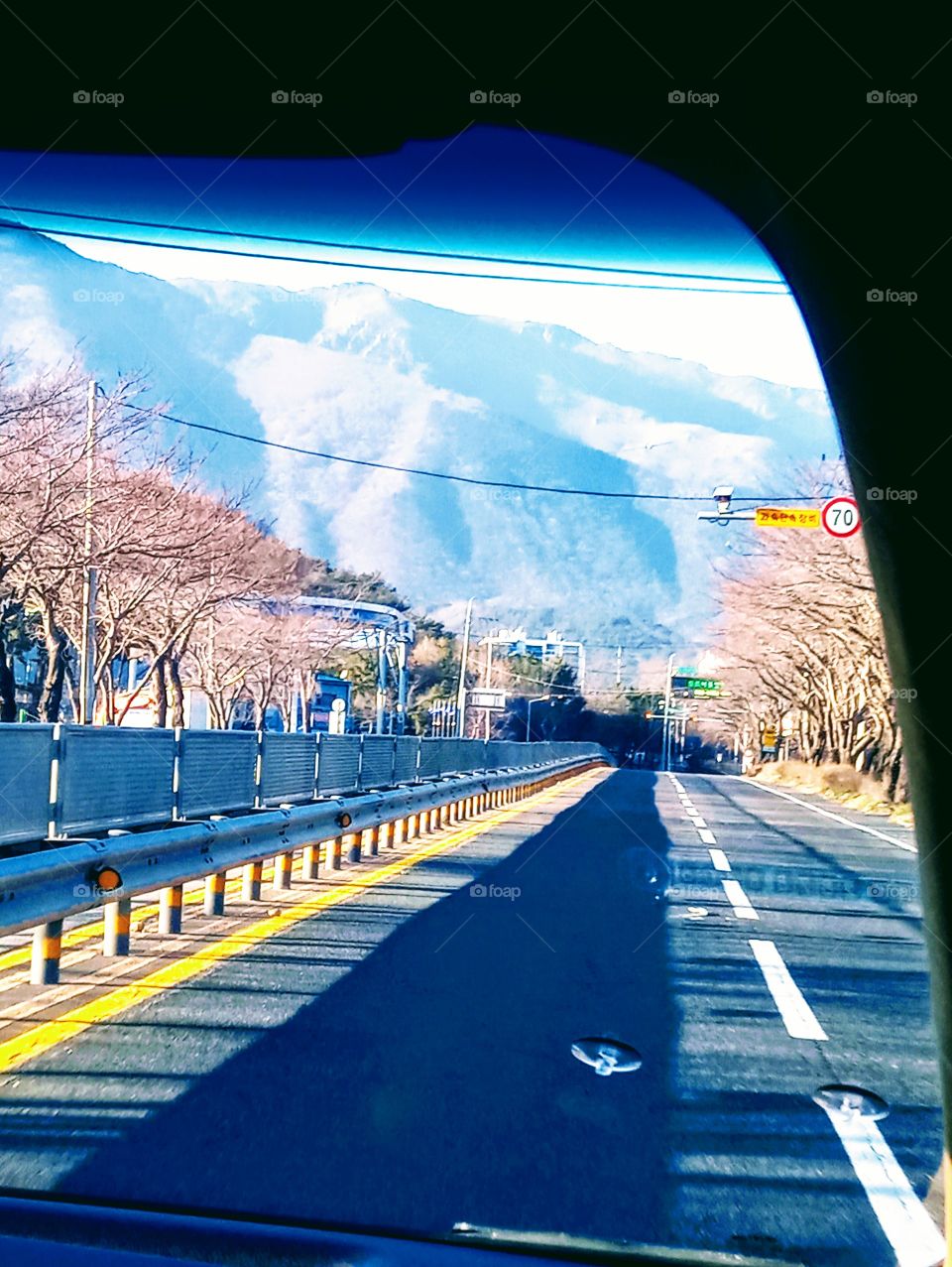 Winter in our home.
Even there is the sunlight you can feel the coldness of the environments.
The Tree leaves in all trees beside the road are all gone.
The mountain is light brown for trees and leaves are dying.