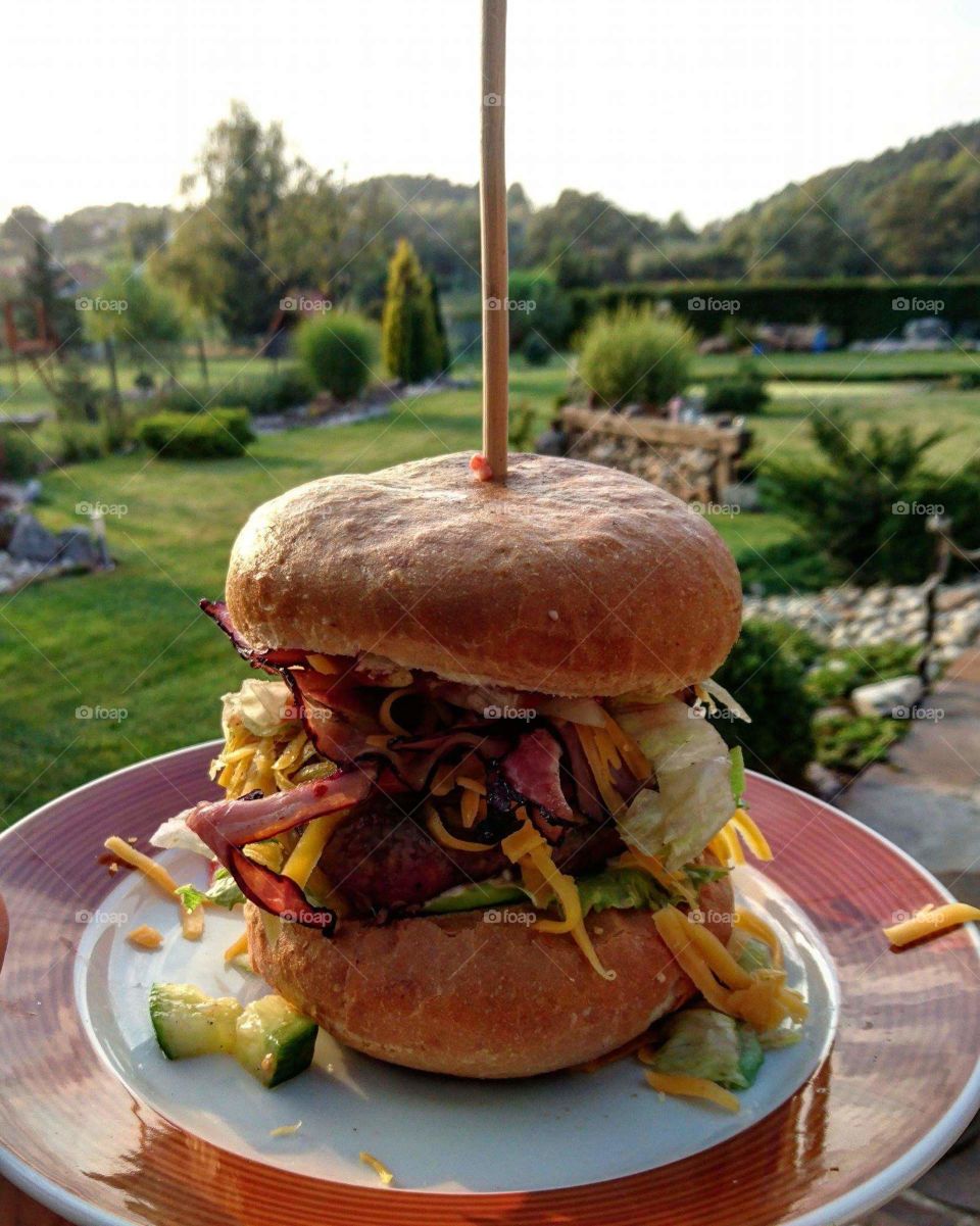 We took a first home burger and it was amazing!!! To prepare rhe burgers we used beef, bacon, lettuce, tomato, cheese, cucumber, some sauces. Well, just about everything belongs to him and makes him an excellent! We hope that you will enjoy our picture