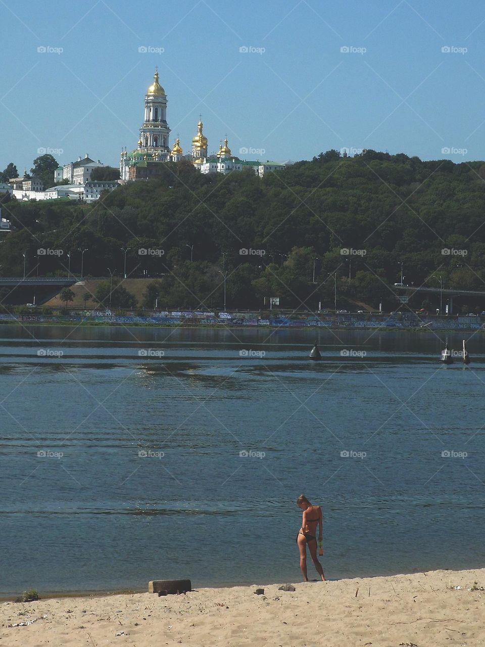 girl on the beach of the Dnieper river