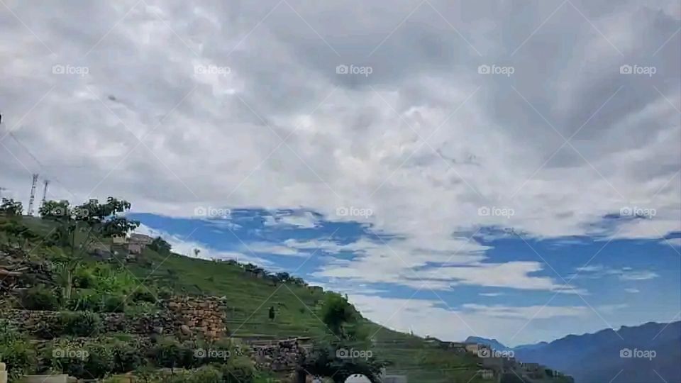 Glory be to God, the magnificent and picturesque view and the natural green trees are a view that is nothing more wonderful than it