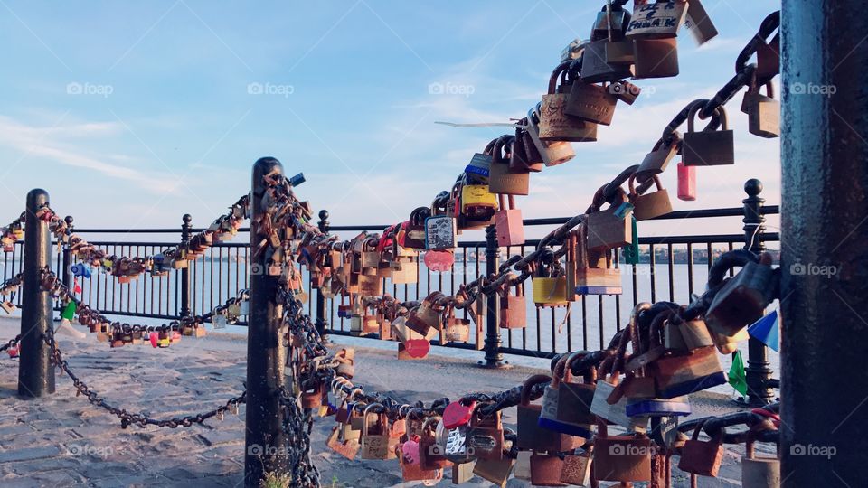 A love lock is a padlock which sweethearts lock to a bridge, fence, gate, monument, or similar public fixture to symbolize their love❤️