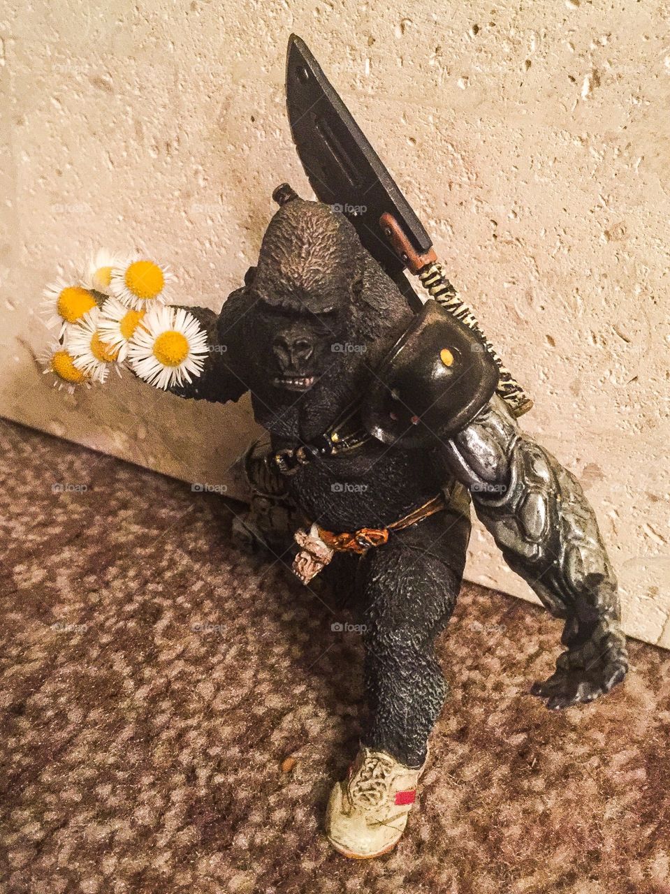 Fill your fist with flowers when your weapons are not in it.