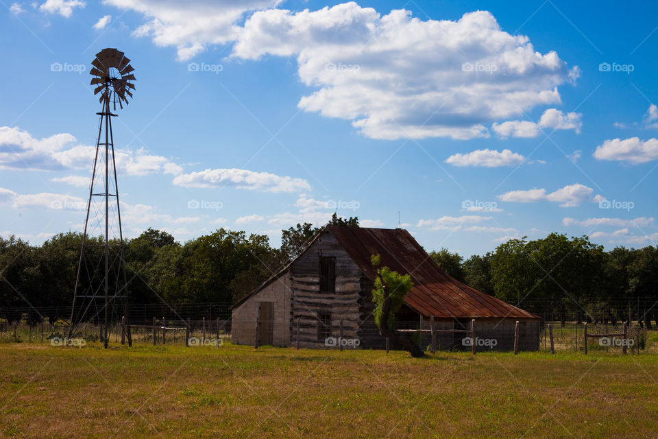 Barn and Windmill. This is a shot of a barn and windmill in Texas.