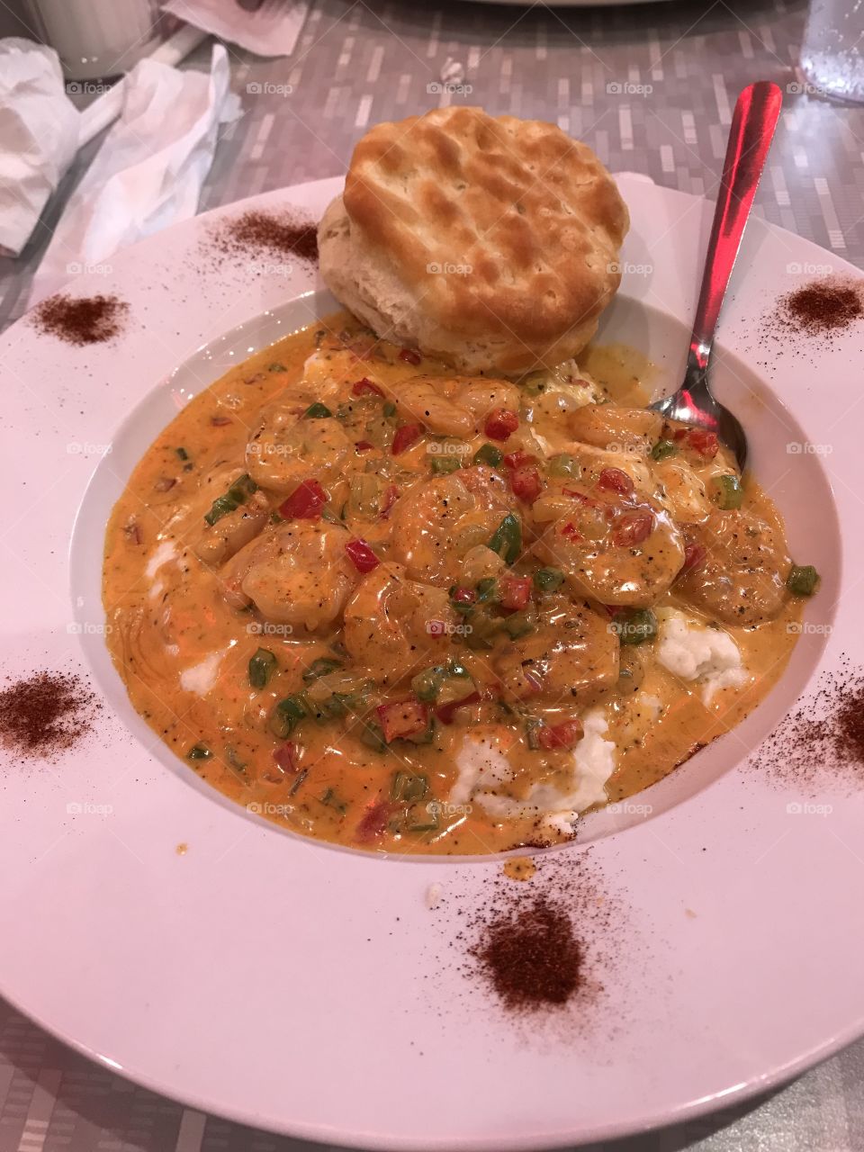 Shrimp and  grits With a biscuit 