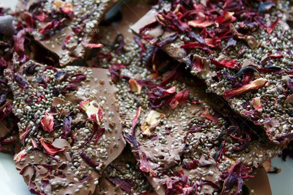 More Chocolate - Hibiscus Chia Chocolate Bark on a white plate