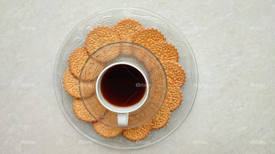 Tea or Coffee with Biscuits which is the most common evening beverages and snacks loved my many Indians, Biscuits are similar to cookies, Coffee presentation, Arrangement