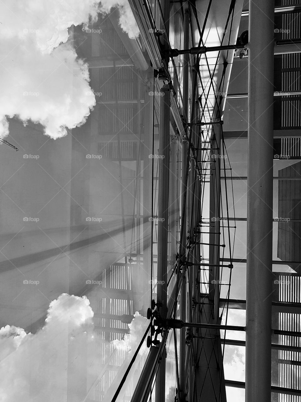 architecture and cloudy sky in black and white