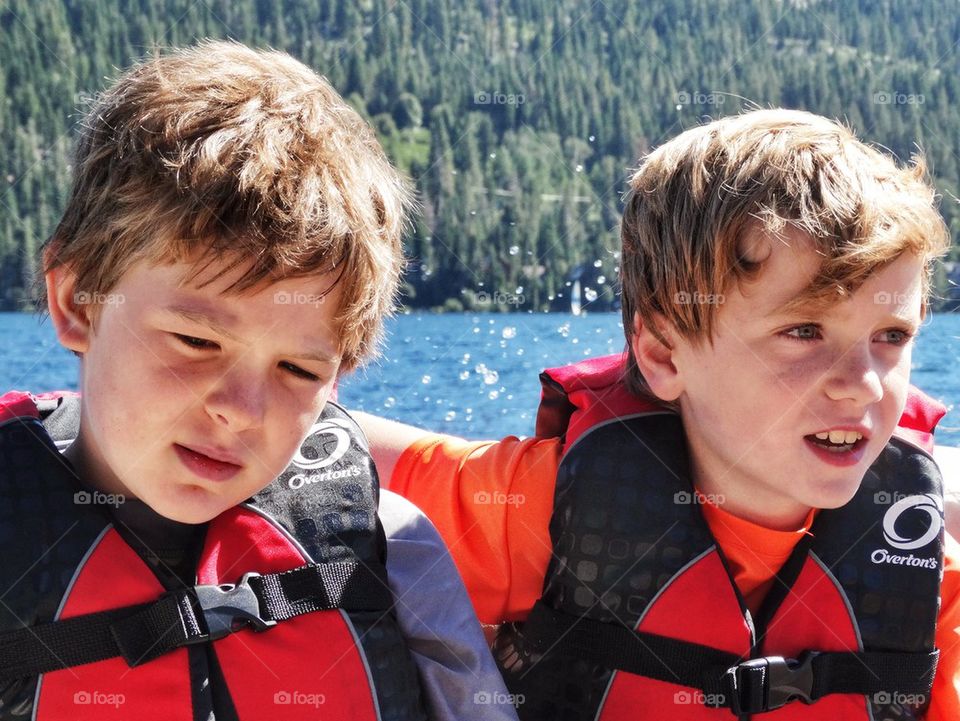 Young Brothers On A Boat
