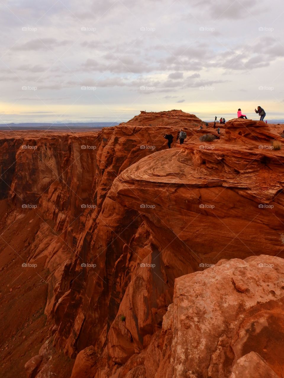 Tourist on Canyon rock