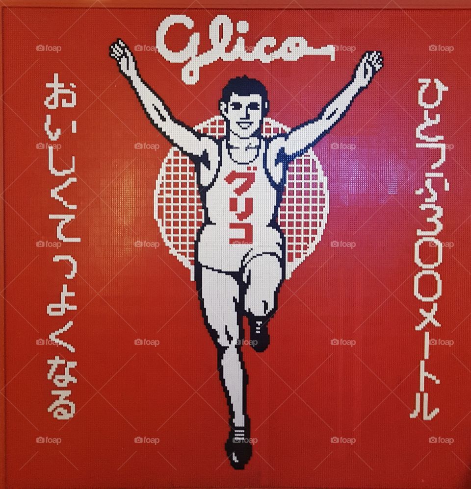 Artwork of famous Glico running advertising in Osaka Japan