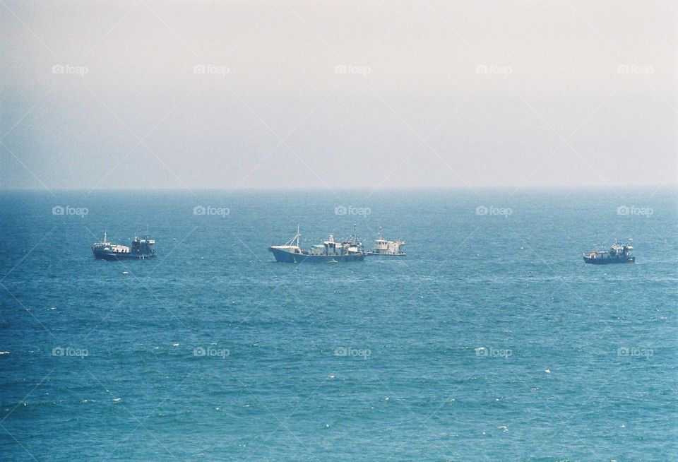 fishing boats. shot with a 35mm Canon film camera.