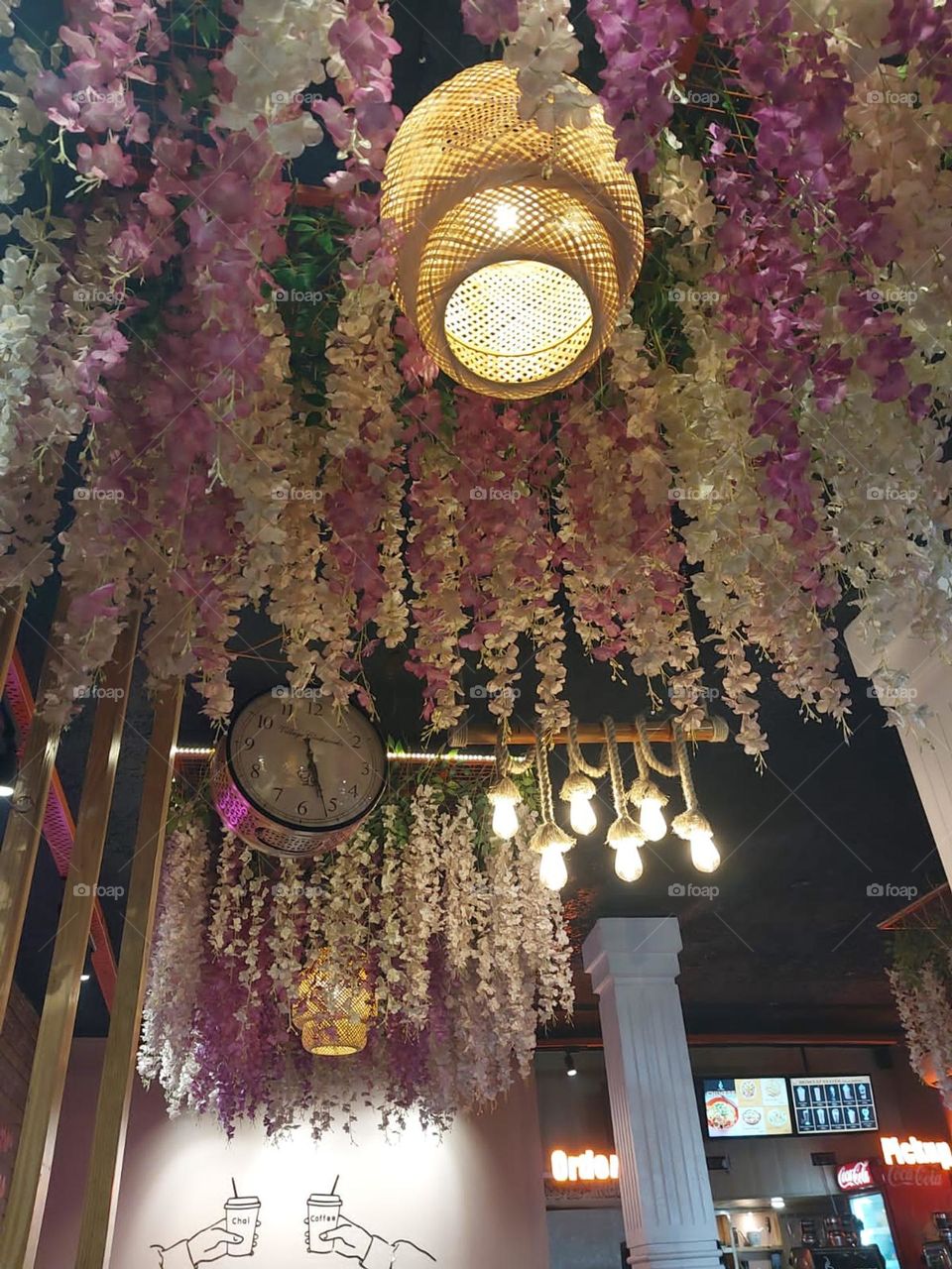 Wow, that chandelier with the white flowers looks so elegant and dreamy! It adds such a lovely touch to the room. ✨💐