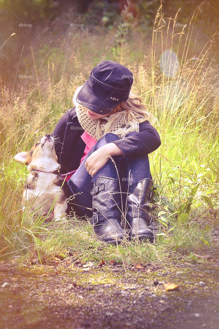 My friend. Girl with her puppy