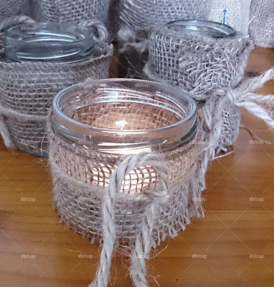 Rustic Styling. Creative use of jars, hessian and twine to make decorations.