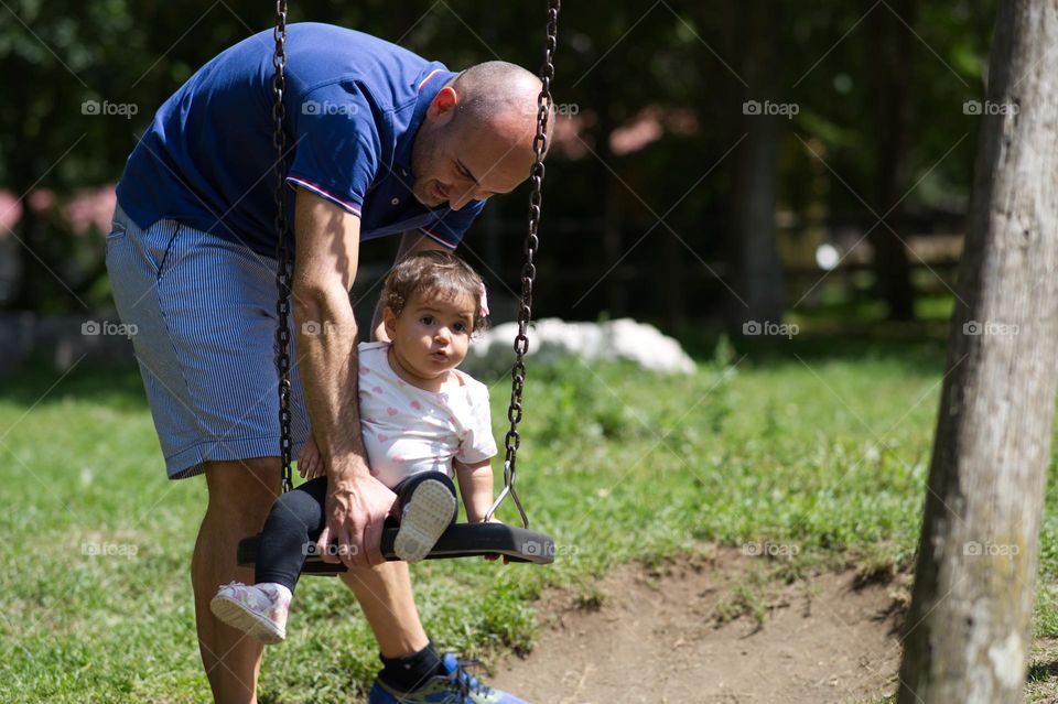 on the swing with dad