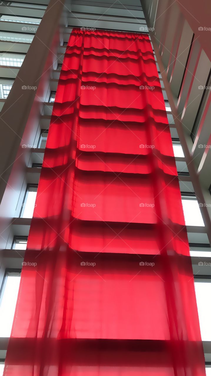 Red draped window 