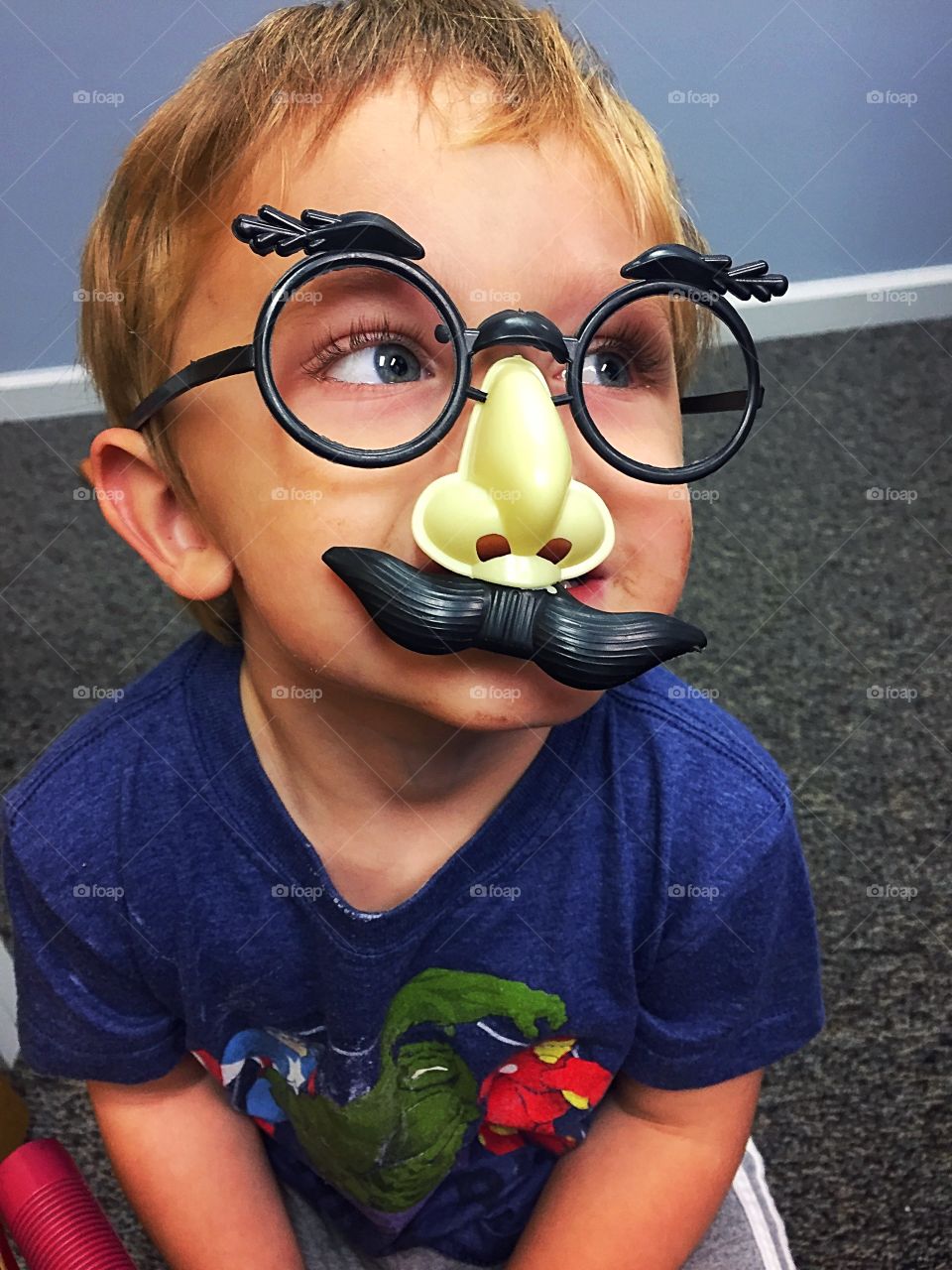 Boy wearing eye mask