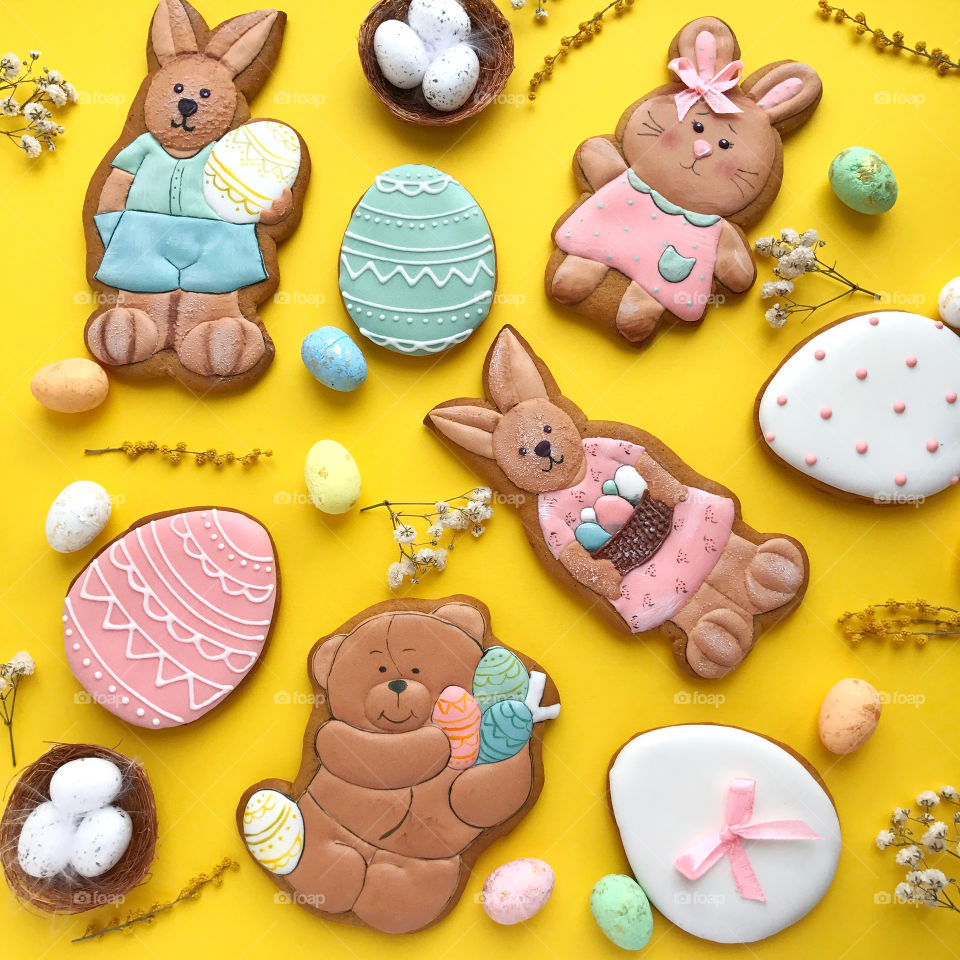 Cute happy Easter cookies. Rabbit with eggs