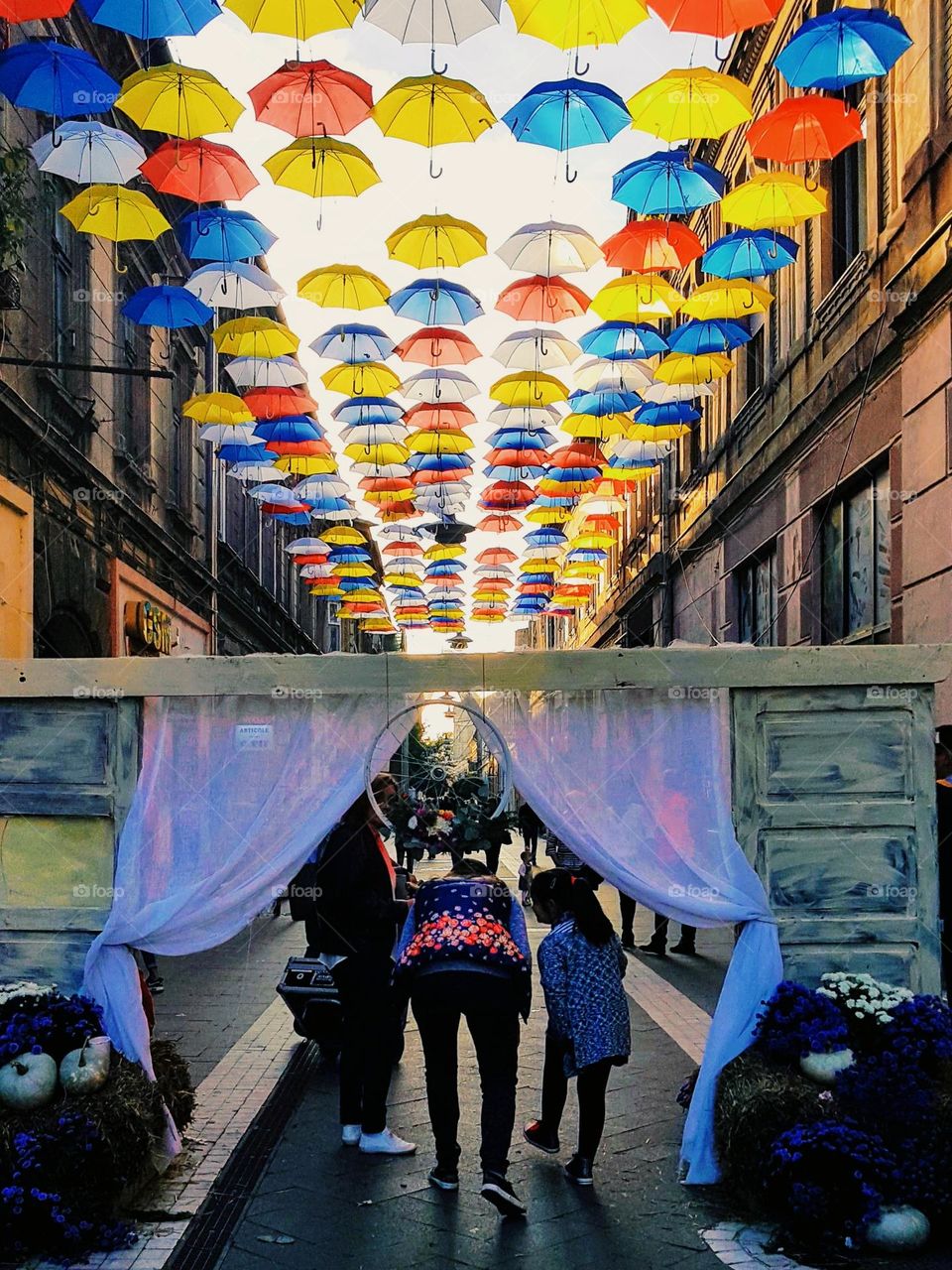 Alley with colored umbrellas