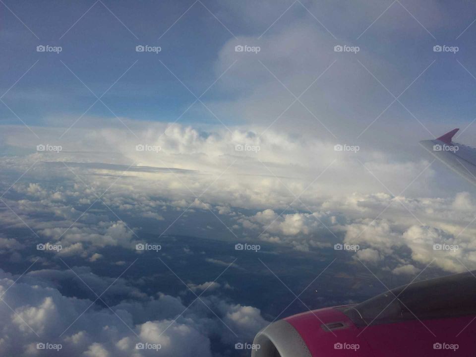 bequtiful view with cloudy sky from airplane